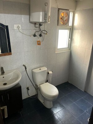 Bathroom in 3 BHK Apartment at Sunworld Vanalika, Sector 107 – for Rent