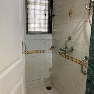 Bathroom in 1 BHK Apartment at Om Sai Shravan CHS, Shimpoli – for Rent