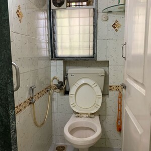 Bathroom in 1 BHK Apartment at Om Sai Shravan CHS, Shimpoli – for Rent