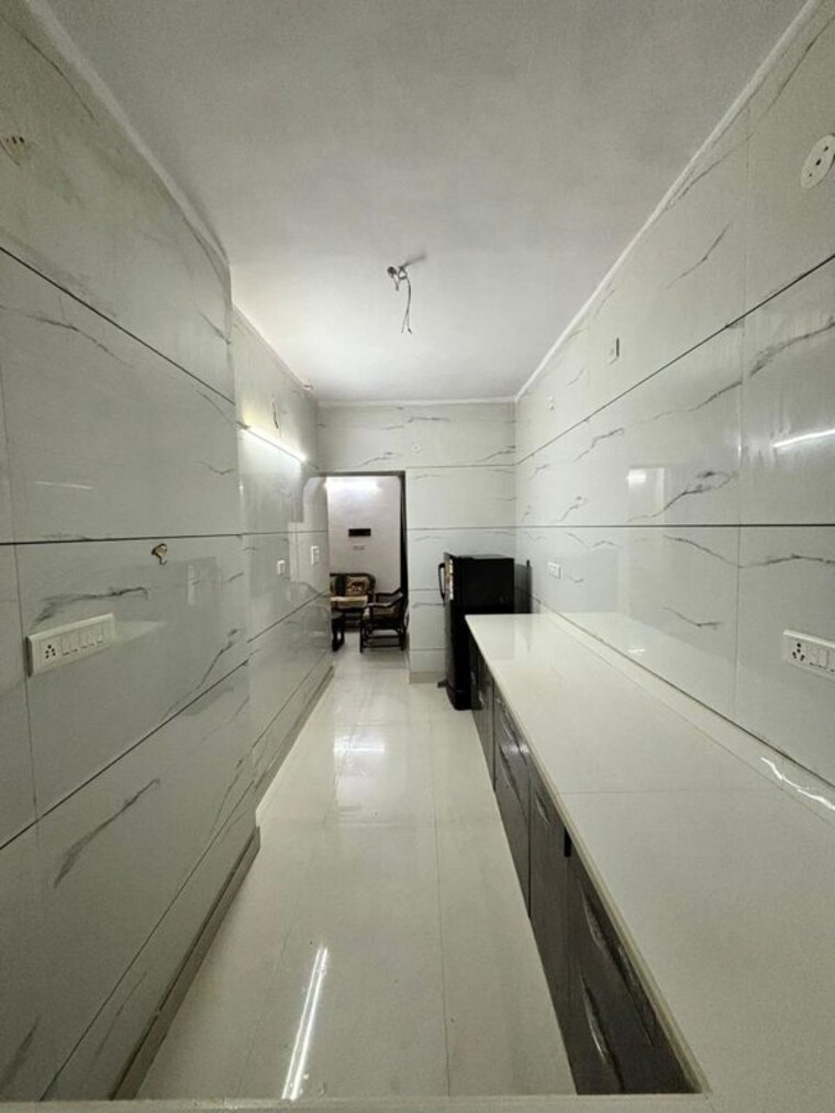 Kitchen, pitampura 1.5 Bedroom 850 Sq.Ft. Apartment In Pitampura Delhi 10572224