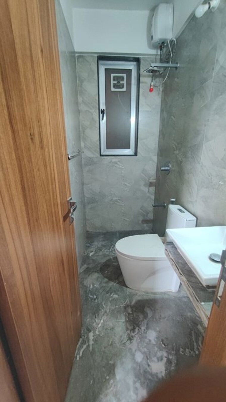 Bathroom, goodwill-unity 2 Bedroom 650 Sq.Ft. Apartment In Sanpada Navi Mumbai 10572196
