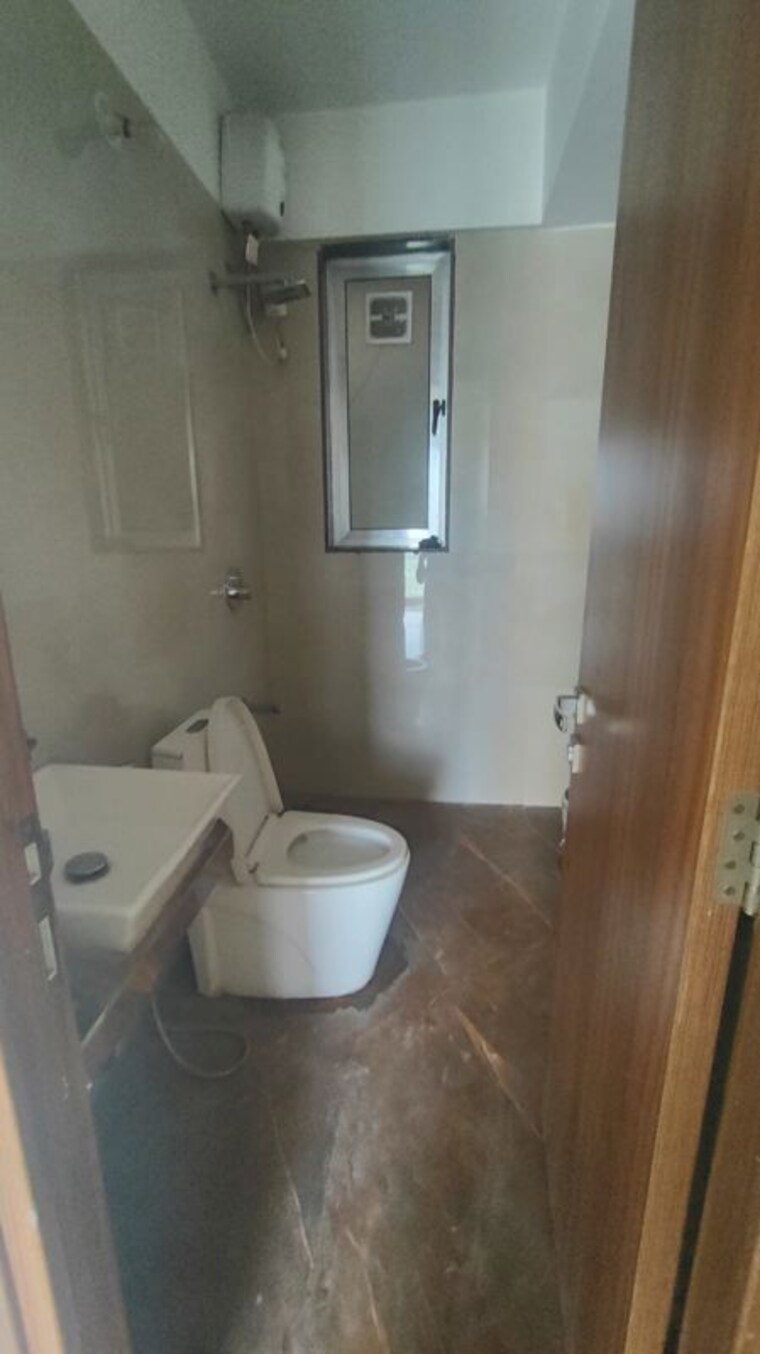 Bathroom, goodwill-unity 2 Bedroom 650 Sq.Ft. Apartment In Sanpada Navi Mumbai 10572196