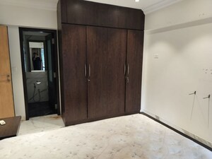 Room in 2 BHK Apartment at Breezy Heights, Bandra West – for Rent