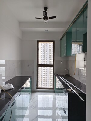 Kitchen in 2 BHK Apartment at Raymond Ten X Habitat, Pokhran Road No Two – for Rent