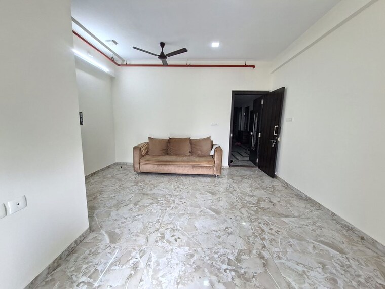 Living Room, larkins-pride-palms 3 Bedroom 900 Sq.Ft. Apartment In Kolshet Road Thane 10572333