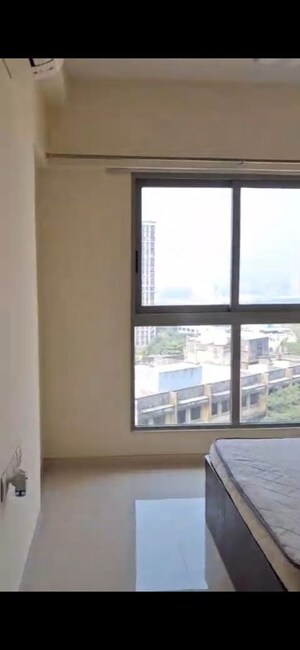 Bedroom in 2 BHK Apartment at The Wadhwa Anmol Fortune, Goregaon West – for Rent