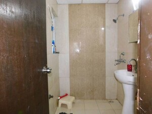 Bathroom in 2.5 BHK Apartment at Antriksh Golf View - II, Sector 78 – for Rent