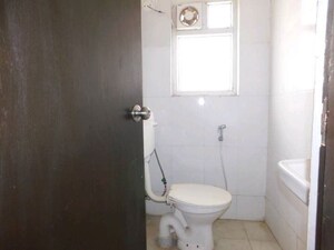 Bathroom in 2.5 BHK Apartment at Antriksh Golf View, Sector 78 – for Rent