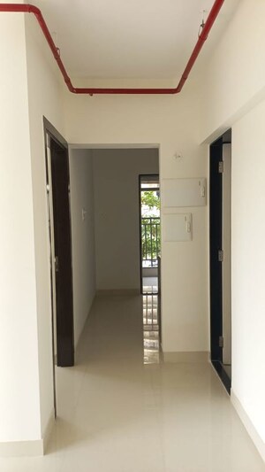 Building Lobby in 2 BHK Apartment at Ashar Metro Towers, Vartak Nagar – for Rent