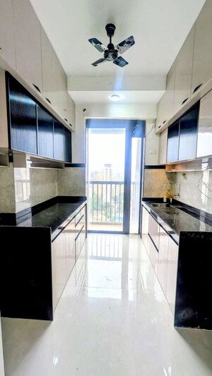 Kitchen in 2 BHK Apartment at Damji Shamji Mahavir Spring Tulip Phase 1, Pokhran Road No Two – for Rent