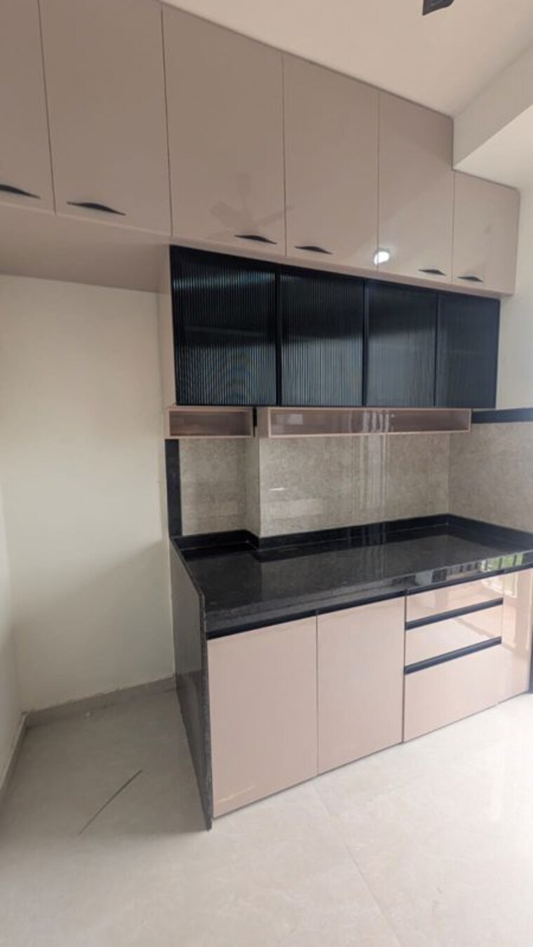 Kitchen, damji-shamji-mahavir-spring-tulip-phase-1 2 Bedroom 720 Sq.Ft. Apartment In Pokhran Road No Two Thane 10572489
