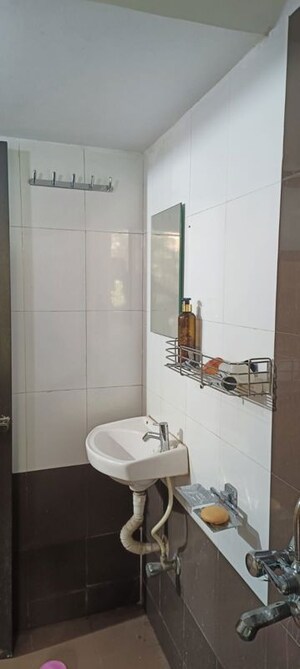 Bathroom in 1.5 BHK Apartment at Godrej Emerald, Ghodbunder Road – for Rent