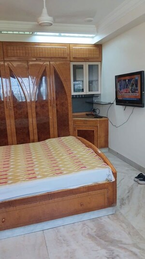 Bedroom in 2 BHK Apartment at Powai Cosmopolitan CHS, Powai – for Rent