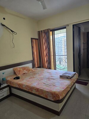 Bedroom in 2 BHK Apartment at Gurukripa Dhruv Heights, Kharghar – for Rent