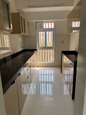 Kitchen in 3 BHK Apartment at Romell Orbis, Andheri East – for Rent