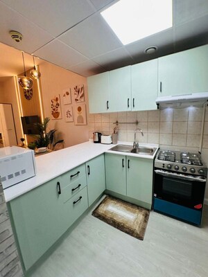 Kitchen in 2 BHK Apartment at Dosti Nest, Balkum Pada – for Sale