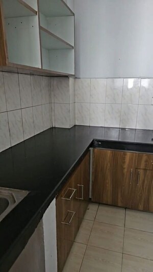 Kitchen in 2 BHK Apartment at Dhakoli – for Rent