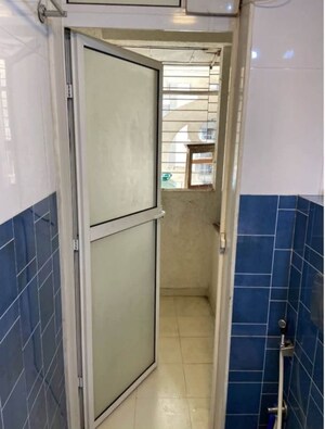 Bathroom in 1 BHK Apartment at Lodha Amara, Kolshet Road – for Rent