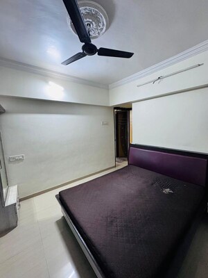 Kitchen in 2 BHK Apartment at Unnati Woods CHS, Kasarvadavali – for Rent