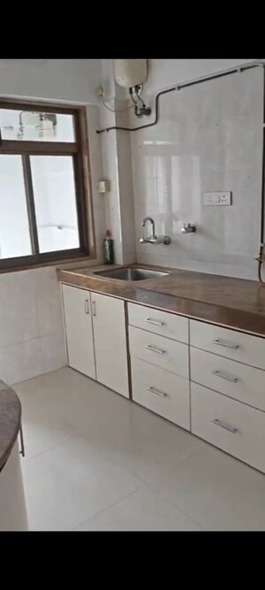 Kitchen in 3 BHK Apartment at Silver Breach Apartment, Juhu – for Rent