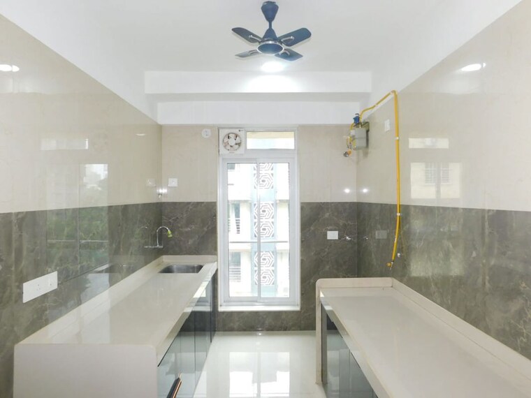 Kitchen, skyline-ashwin 2 Bedroom 700 Sq.Ft. Apartment In Jay Prakash Nagar Mumbai 10572781