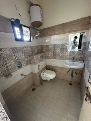 Bathroom in 3 BHK Builder Floor at Vasant Vihar – for Sale