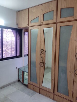 Bedroom in 2 BHK Apartment at Harshvardhan CHS Powai, Powai – for Rent