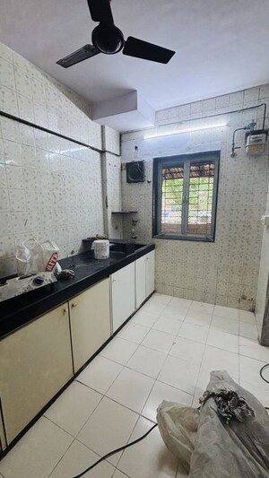 Kitchen in 2 BHK Apartment at Yogi Hills, Mulund West – for Rent