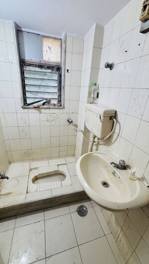 Bathroom in 2 BHK Apartment at Yogi Hills, Mulund West – for Rent