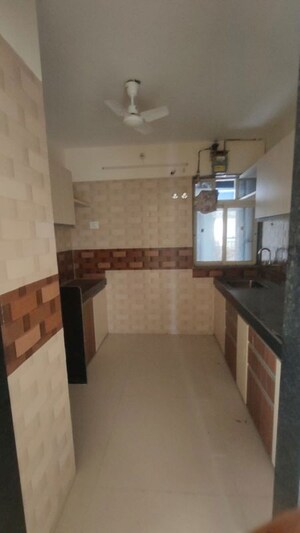 Kitchen in 2 BHK Apartment at Jangid Galaxy, Ghodbunder Road – for Sale