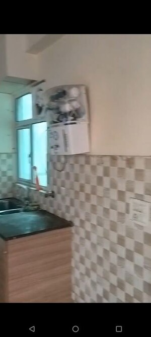 Kitchen in  Apartment at Gaur City 5th Avenue, Sector 4 Greater Noida – for Rent