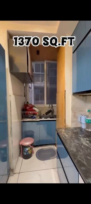 Kitchen in  Apartment at Mahagun My Woods, Sector 16c Greater Noida – for Sale