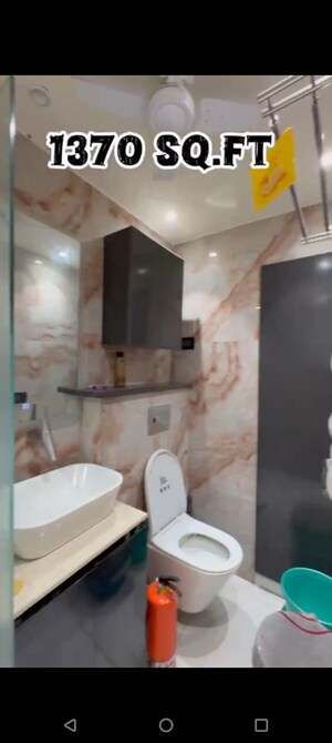 Bathroom in  Apartment at Mahagun My Woods, Sector 16c Greater Noida – for Sale