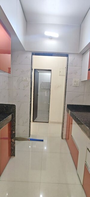 Kitchen in 1 BHK Apartment at Dharti Pressidio, Kandivali West – for Rent