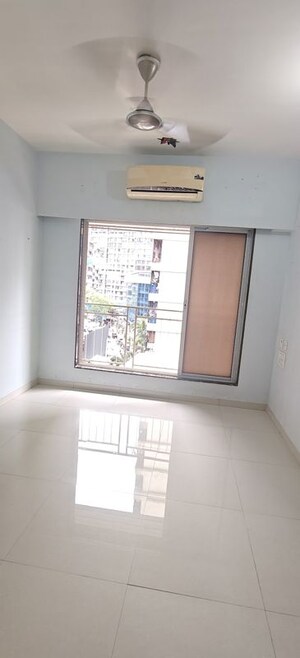 Room in 1 BHK Apartment at Dharti Pressidio, Kandivali West – for Rent