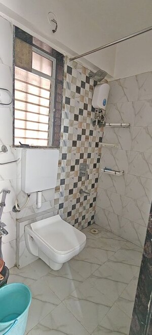 Bathroom in 1 BHK Apartment at Dharti Pressidio, Kandivali West – for Rent