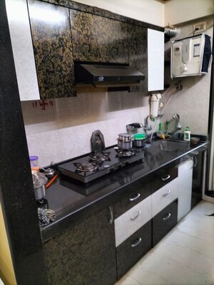 Kitchen in 2 BHK Apartment at RDC Pinewood, Thane West – for Rent