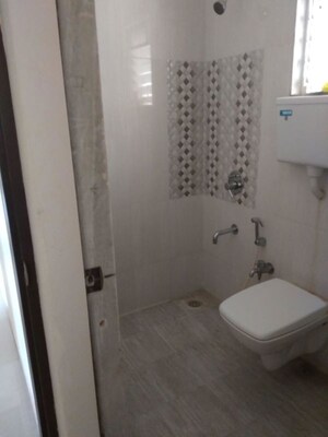 Bathroom in 2 BHK Apartment at Sai Baba Vihar Complex, Ghodbunder Road – for Rent