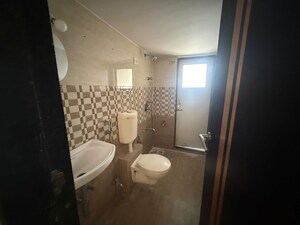 Bathroom in 2 BHK Apartment at Kishor Sukur Enclave A, Ghodbunder Road – for Rent