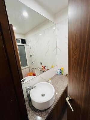 Bathroom in 4 BHK Apartment at Omkar Alta Monte, Malad East – for Rent