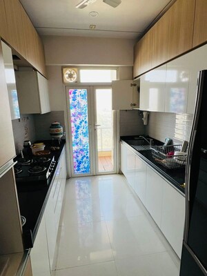 Kitchen in 4 BHK Apartment at Omkar Alta Monte, Malad East – for Rent