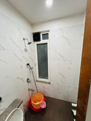 Bathroom in 4 BHK Apartment at Omkar Alta Monte, Malad East – for Rent