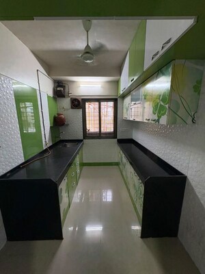 Kitchen in 2 BHK Apartment at Sudarshan Sky Garden, Ghodbunder Road – for Rent