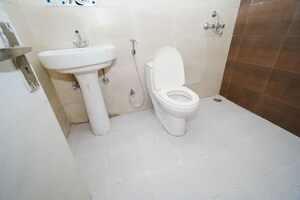 Bathroom in 2 BHK Apartment at Mittal Rajnagar Residency, Raj Nagar Extension – for Sale
