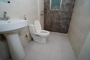 Bathroom in 2 BHK Apartment at Mittal Rajnagar Residency, Raj Nagar Extension – for Sale