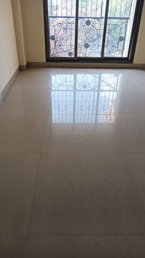 Living Room in 2 BHK Apartment at Woodland Crest Apartment, Andheri East – for Sale