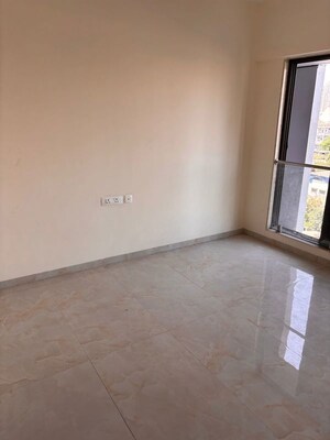 Room in 2 BHK Apartment at IM Applaud 38, Goregaon East – for Rent