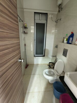 Bathroom in 3 BHK Apartment at Runwal Greens, Mulund West – for Rent