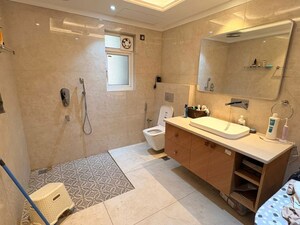 Attached Bathroom in 4 BHK Apartment at Mahindra Lifespaces Chloris, Sector 19 – for Sale