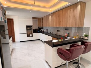 Kitchen in 4 BHK Apartment at Mahindra Lifespaces Chloris, Sector 19 – for Sale